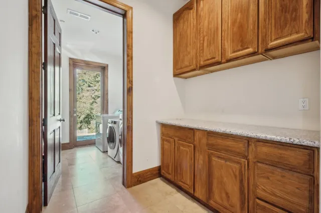 a view of an entryway with hallway