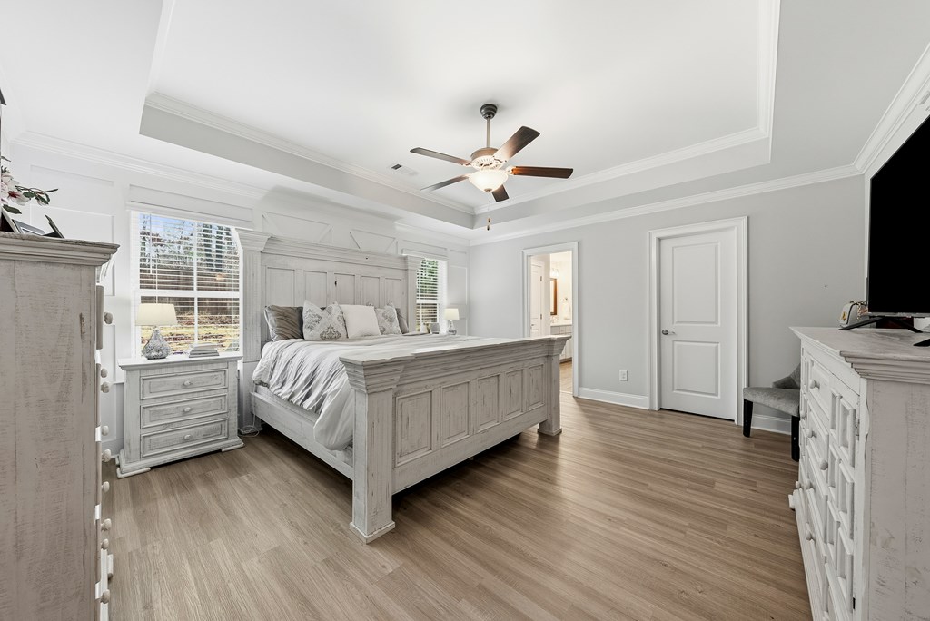 41 Loblolly Lane Fortson, GA 31808 - Photo 21 of 42 Master bedroom with custom wood-work wall.