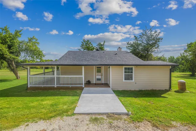 a front view of house with yard
