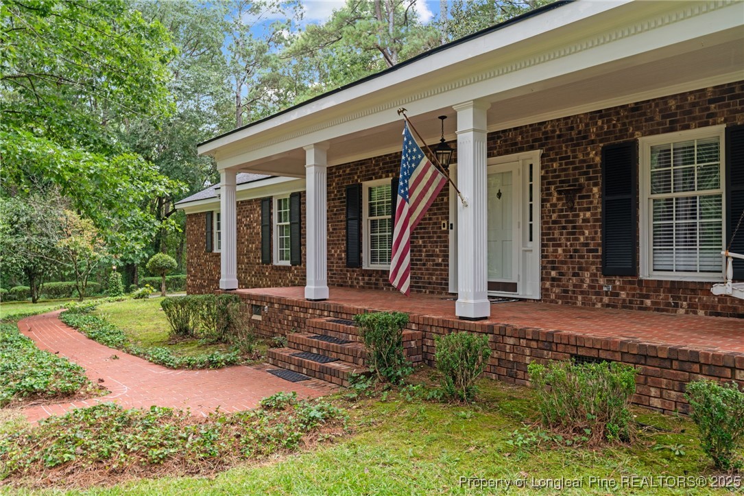 610 Maynard Lake Road Erwin, NC 28339 - Photo 46 of 49 a view of a house with backyard