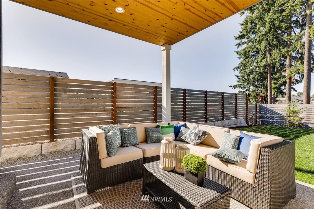 4427 232nd Place Southeast, Unit 20 Bothell, WA 98021 - Photo 26 of 28 a view of patio with couches and potted plants