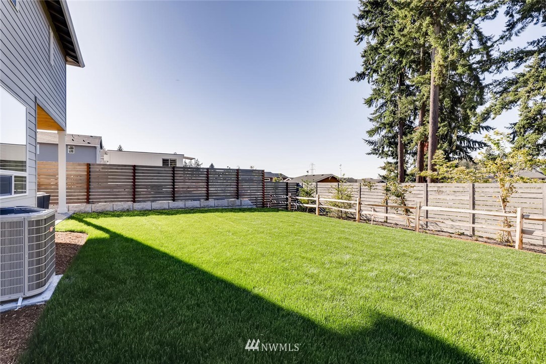 4427 232nd Place Southeast, Unit 20 Bothell, WA 98021 - Photo 27 of 28 a view of a backyard