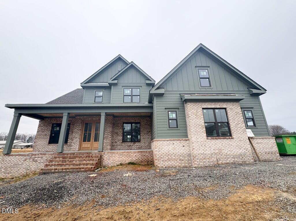 5848 Carriage Drive Raleigh, NC 27603 - Photo 1 of 26 a front view of a house with yard