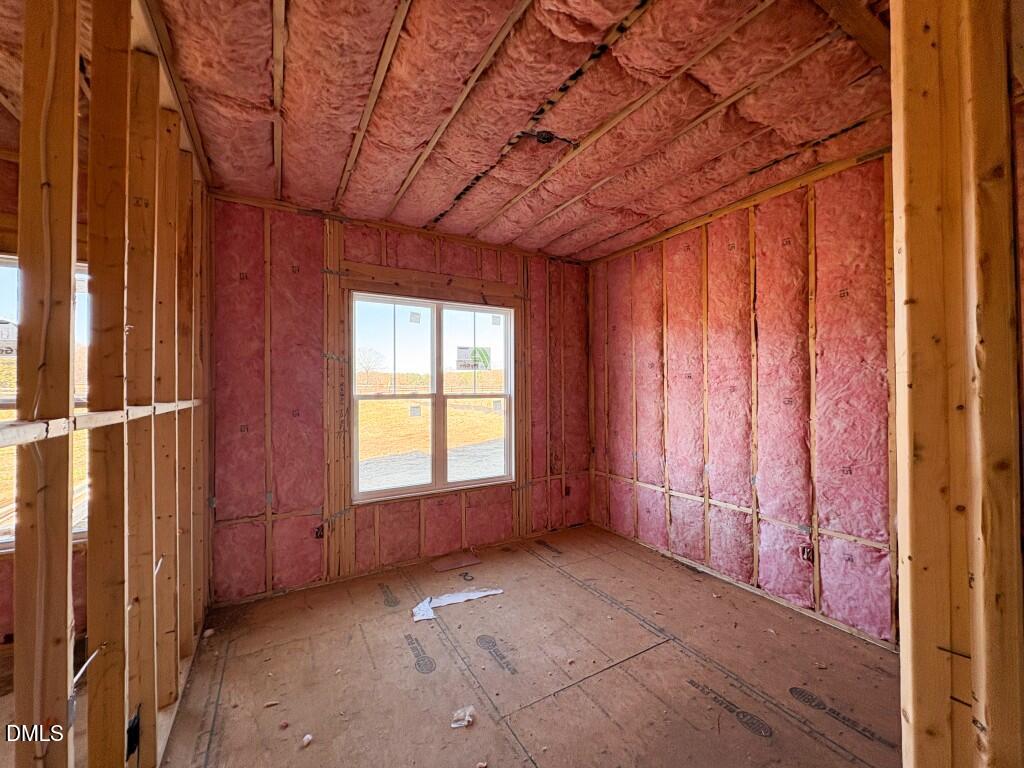 5848 Carriage Drive Raleigh, NC 27603 - Photo 11 of 24 a view of an empty room with a window