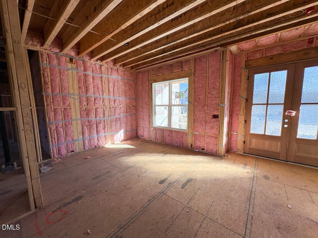 5848 Carriage Drive Raleigh, NC 27603 - Photo 17 of 24 a view of empty room with windows
