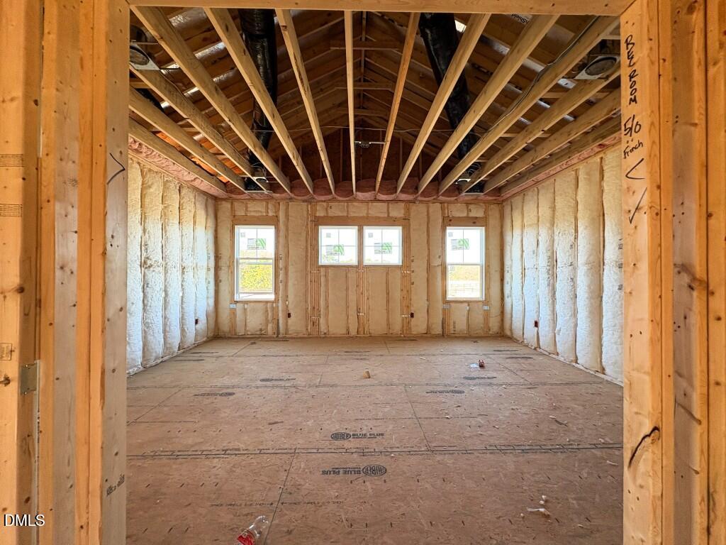 5848 Carriage Drive Raleigh, NC 27603 - Photo 18 of 24 a view of an empty room with windows