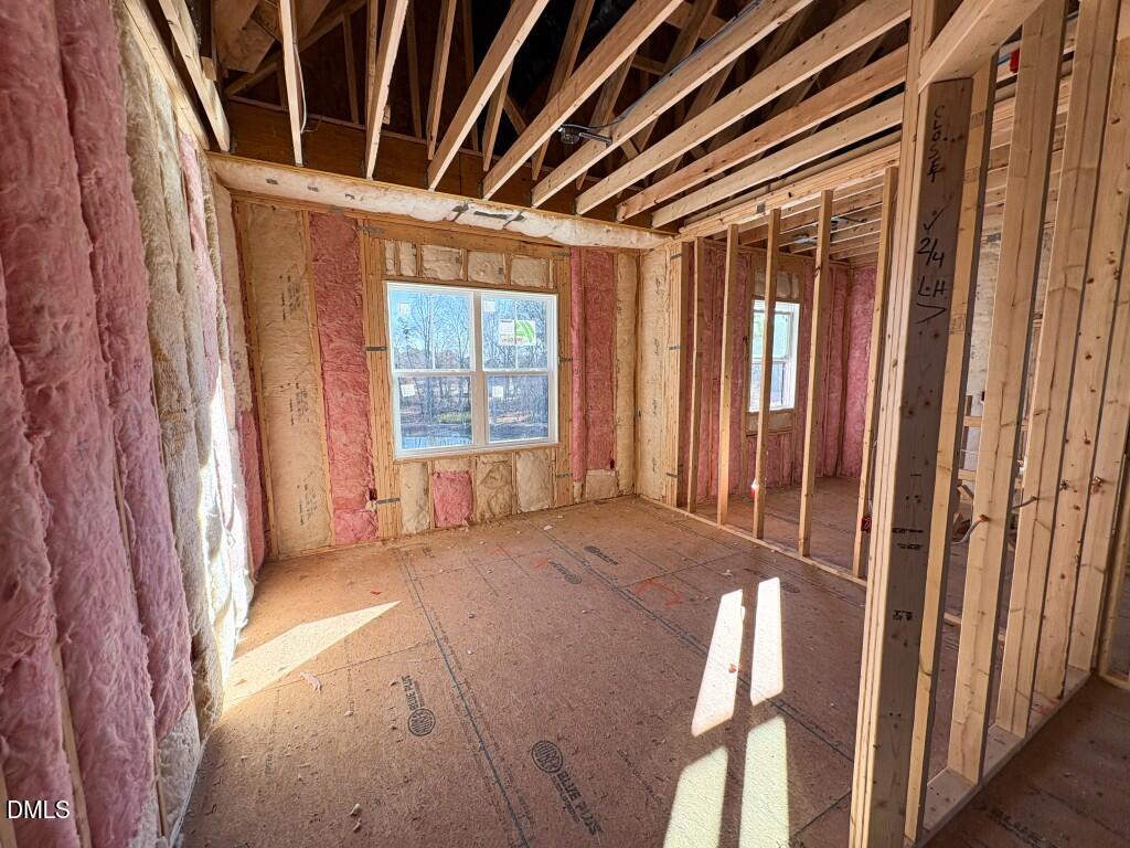 5848 Carriage Drive Raleigh, NC 27603 - Photo 21 of 24 a view of an empty room with a window