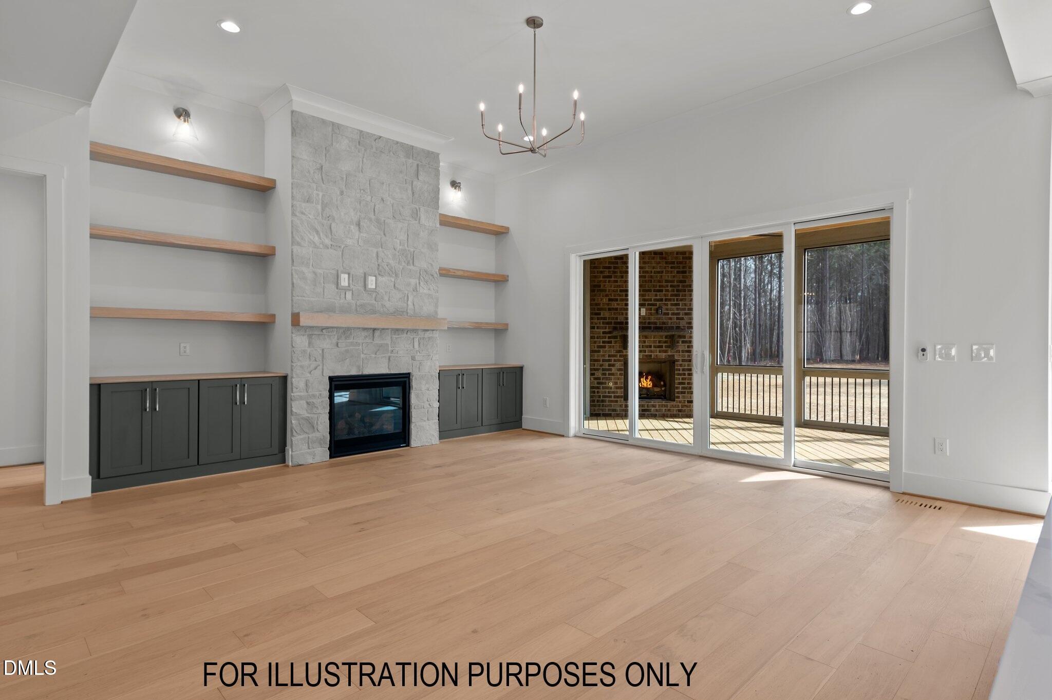 5848 Carriage Drive Raleigh, NC 27603 - Photo 21 of 28 a view of an empty room with a fireplace and a window