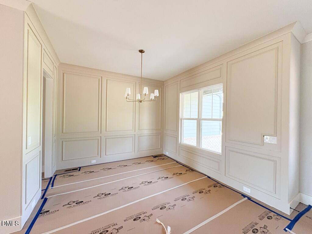 5848 Carriage Drive Raleigh, NC 27603 - Photo 3 of 28 a view of entryway with front door