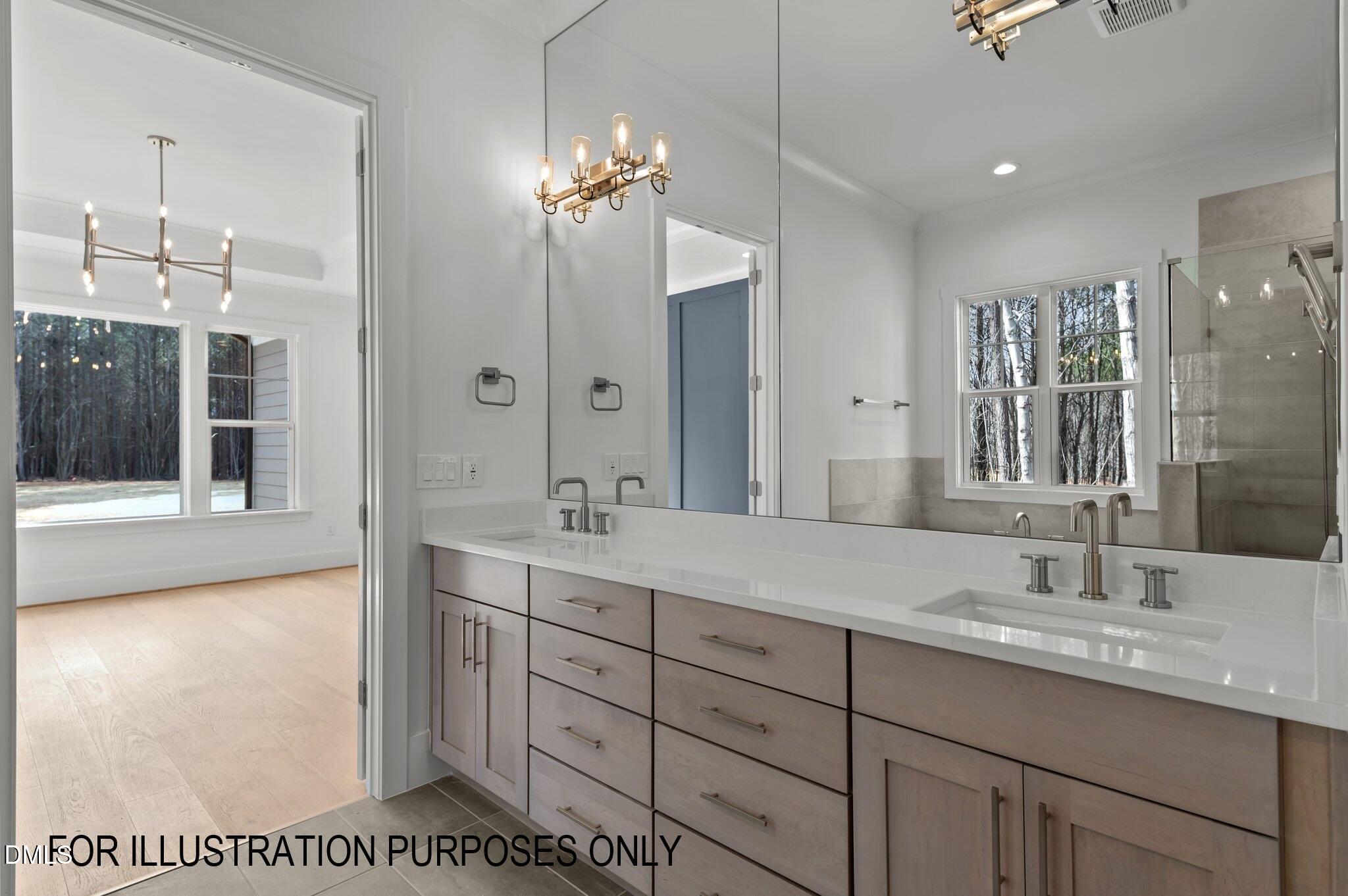 5848 Carriage Drive Raleigh, NC 27603 - Photo 8 of 24 a bathroom with a sink double vanity and a mirror