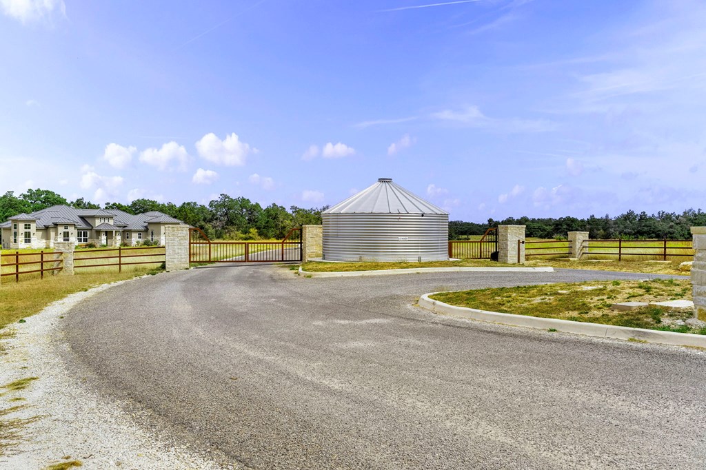 701 Windmill Ridge, Unit 90 Blanco, TX 78606 - Photo 16 of 18 a view of swimming pool with outdoor seating and city view