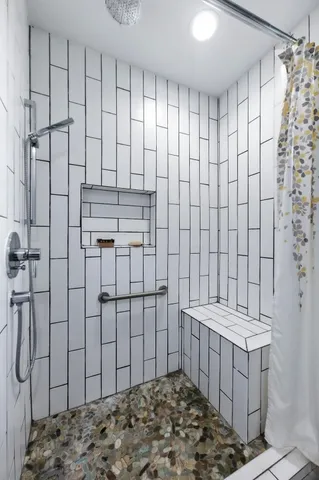 a bathroom with a sink and a shower