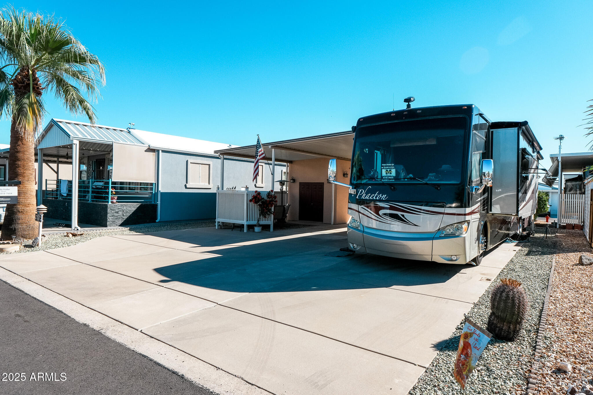 17200 West Bell Road, Unit 1242 Surprise, AZ 85374 - Photo 4 of 12 a house view with a garden space