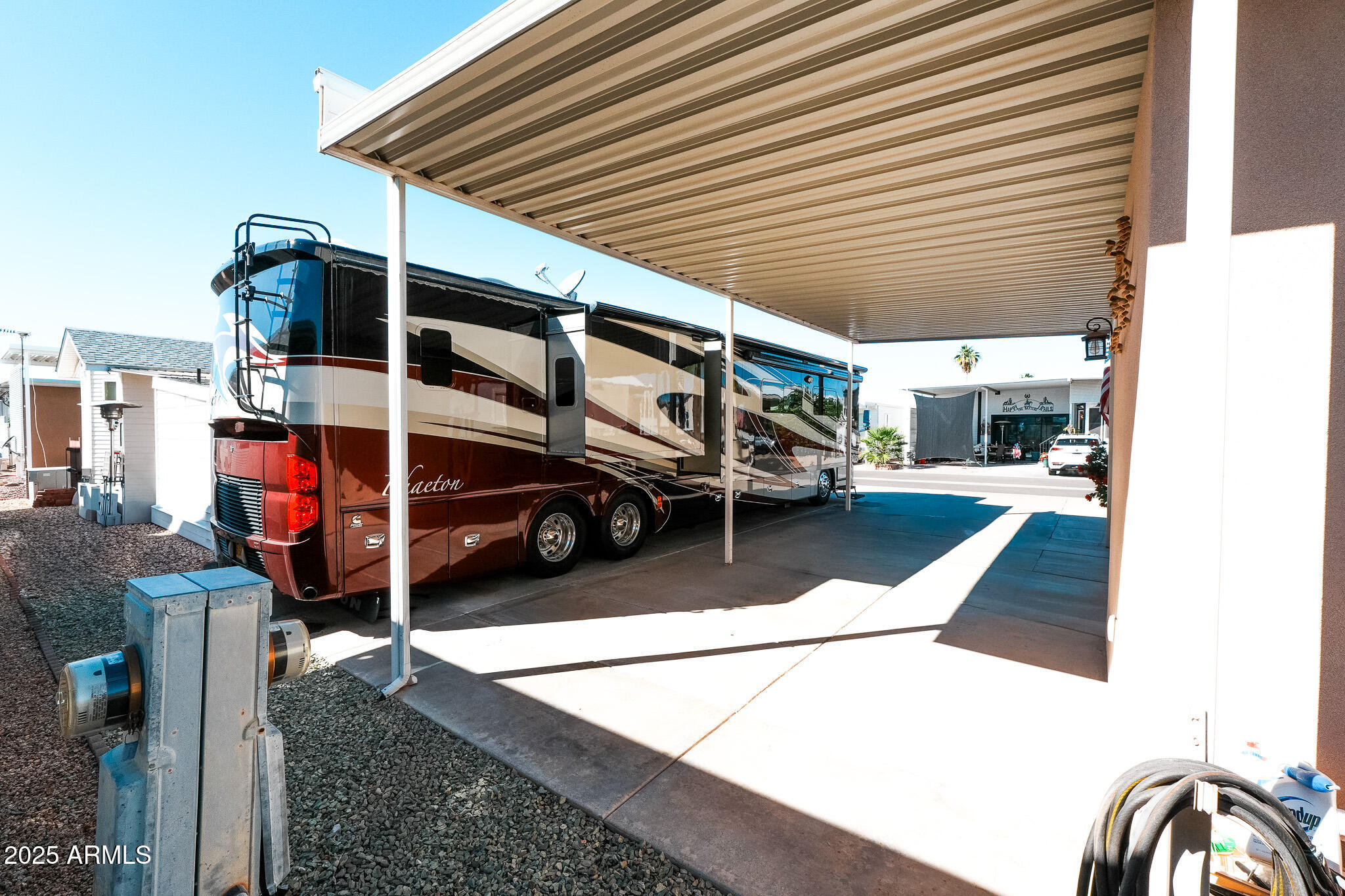 17200 West Bell Road, Unit 1242 Surprise, AZ 85374 - Photo 8 of 12 a view of a patio with a table and chairs