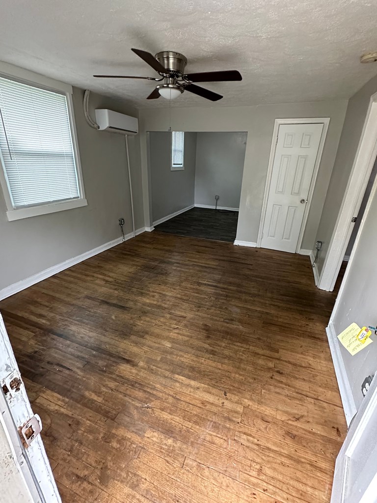 475 Mellon Street Columbus, GA 31903 - Photo 5 of 7 a view of a room with wooden floor and staircase