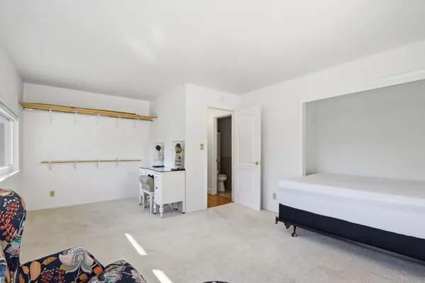 a bathroom with a bathtub and a sink