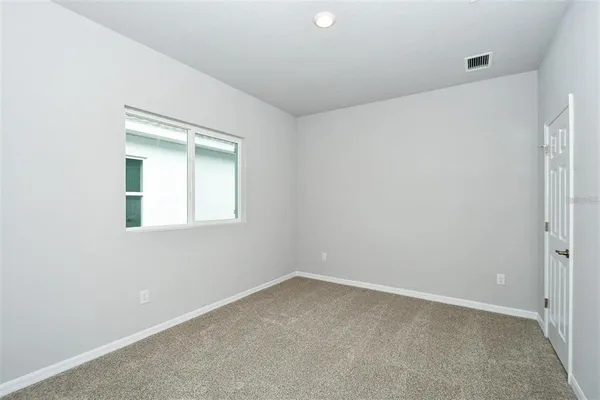 an empty room with a window