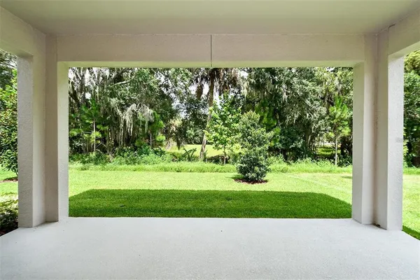 a view of a garden and basketball court