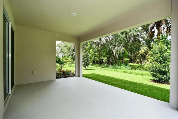 a view of a garden with an outdoor space