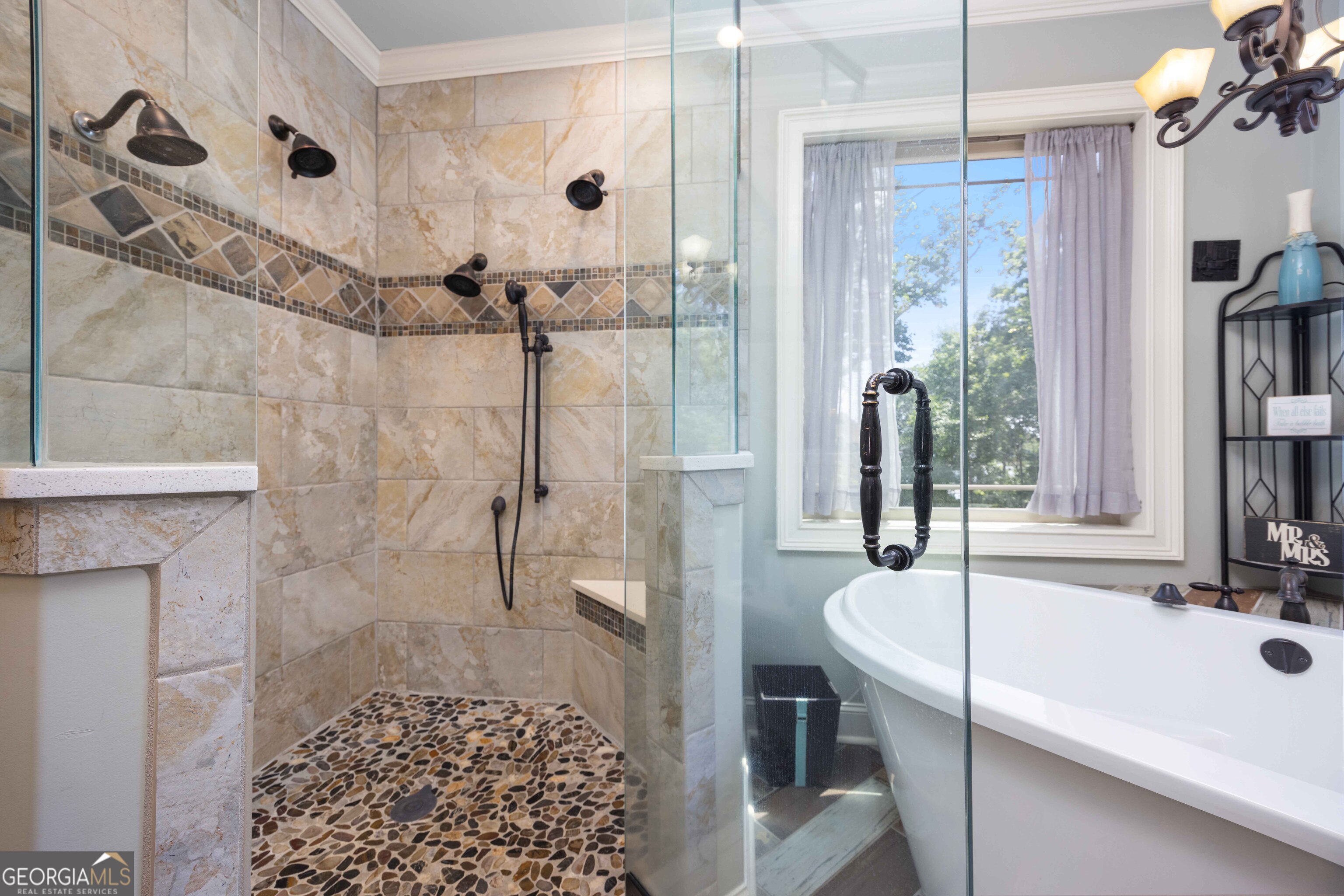 695 Boat Club Road Hamilton, GA 31811 - Photo 26 of 62 a bathroom with a tub a sink and a shower