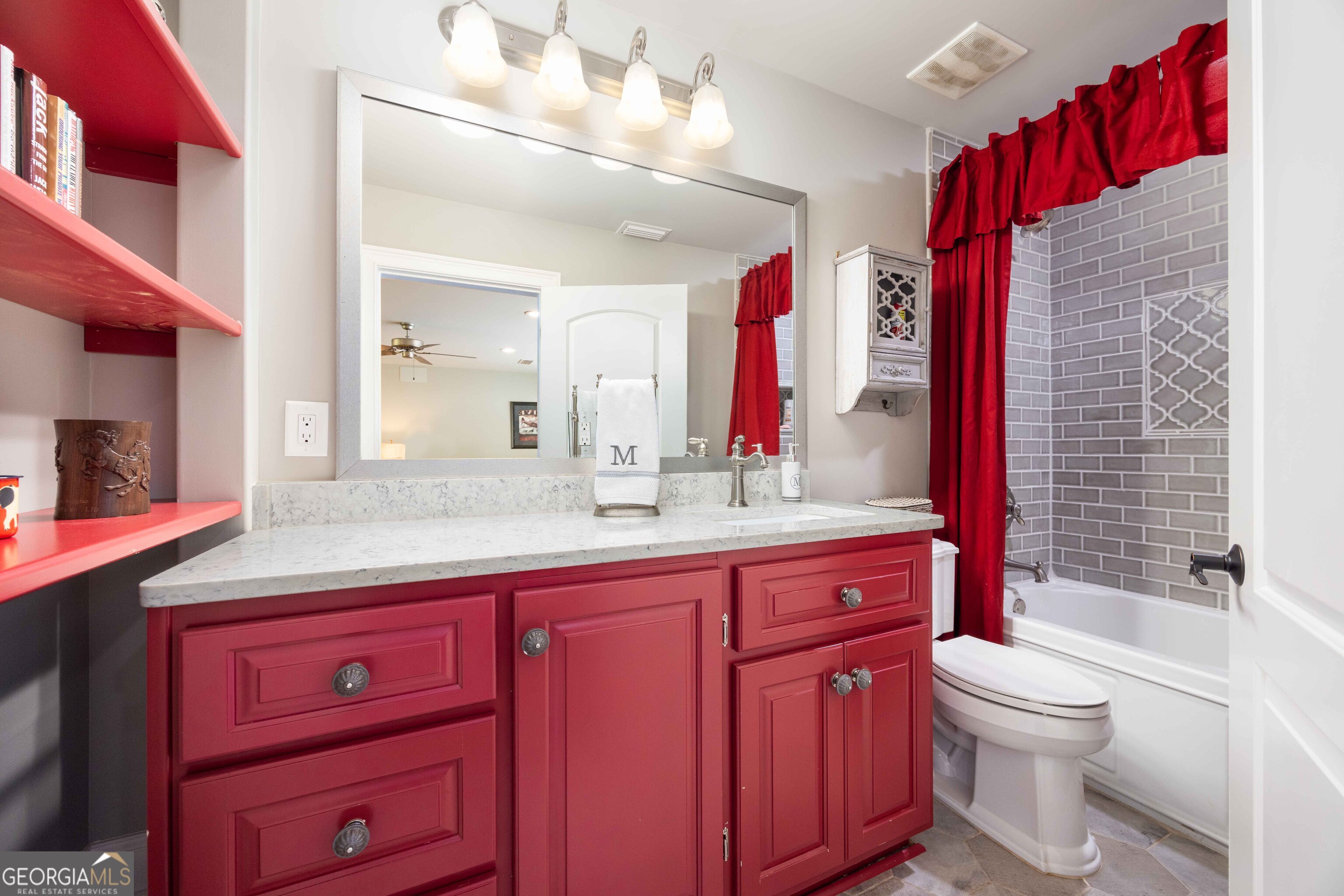 695 Boat Club Road Hamilton, GA 31811 - Photo 34 of 62 a bathroom with a sink a toilet and shower