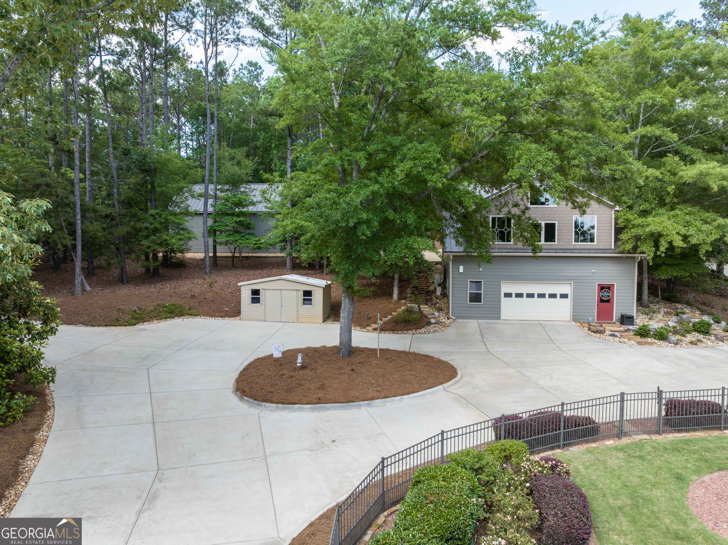 695 Boat Club Road Hamilton, GA 31811 - Photo 59 of 62 a front view of a house with garden