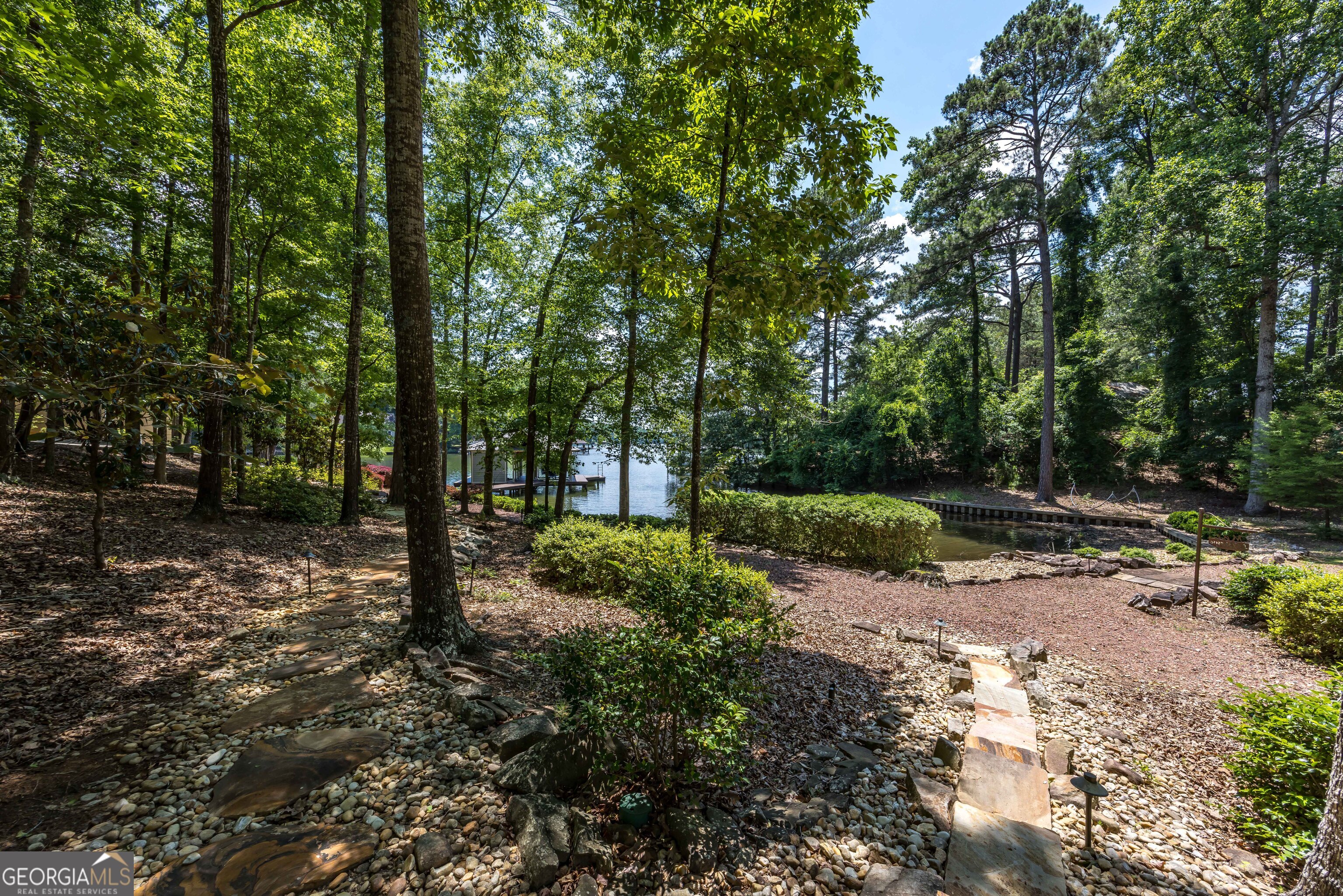695 Boat Club Road Hamilton, GA 31811 - Photo 62 of 62 a view of a tree in the middle of a forest