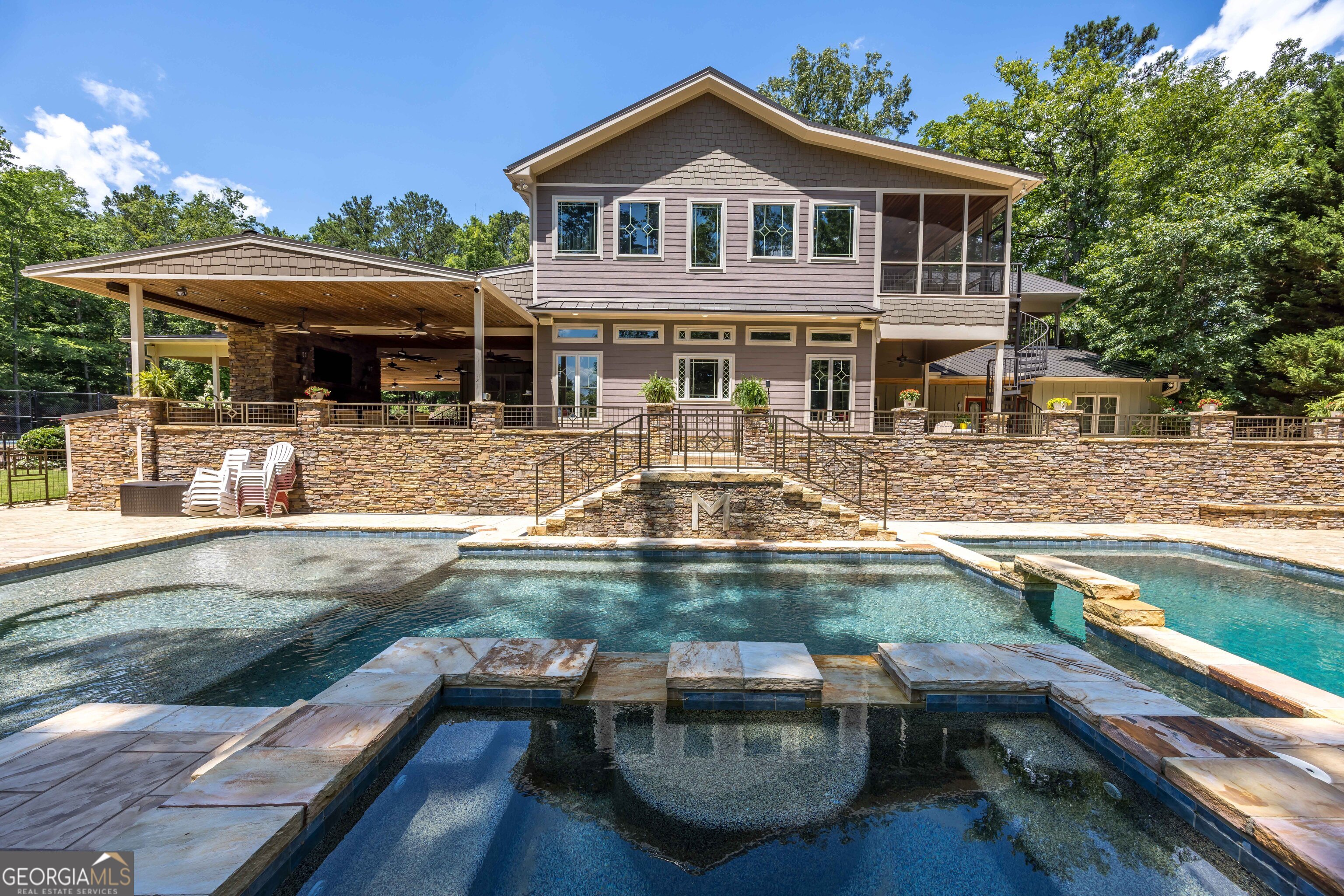 695 Boat Club Road Hamilton, GA 31811 - Photo 7 of 62 a view of house with swimming pool and outdoor seating