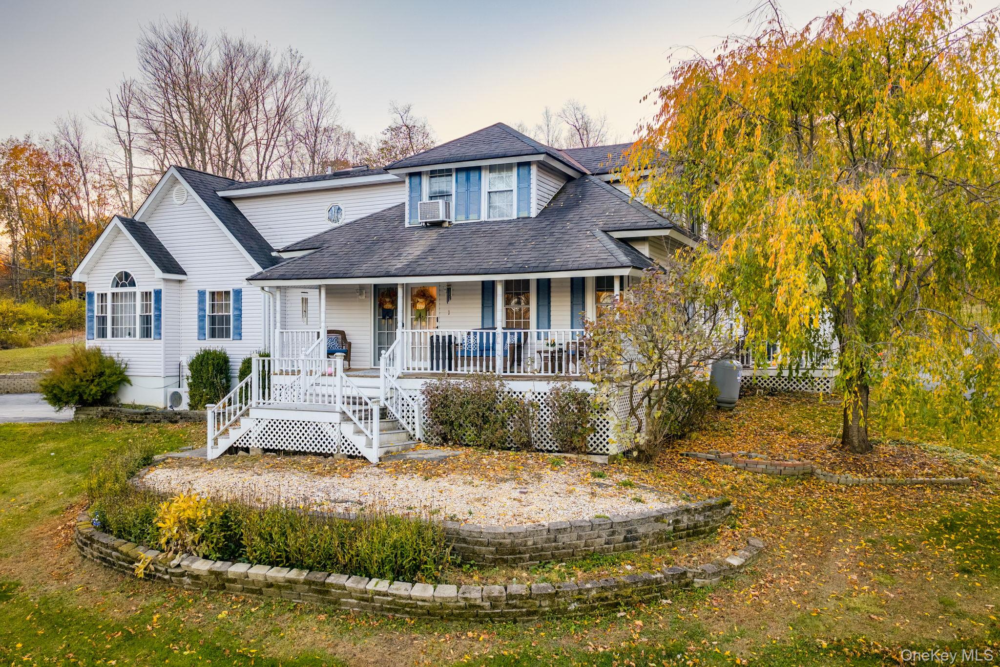 179 Reservoir Road Middletown, NY 10940 - Photo 3 of 50 View of front facade featuring a shingled roof, a porch, and stairs