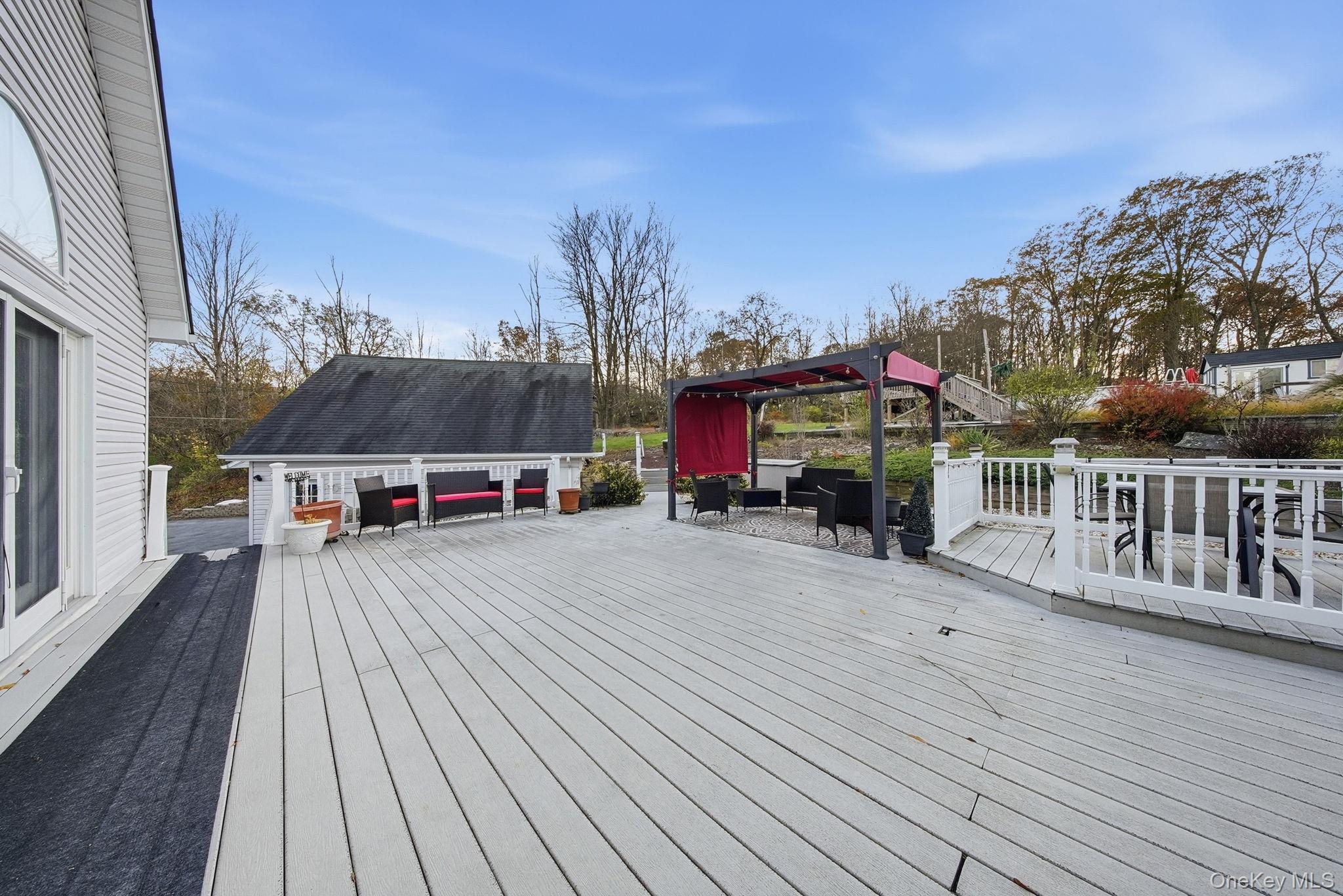 179 Reservoir Road Middletown, NY 10940 - Photo 41 of 50 Wooden terrace with an outdoor hangout area