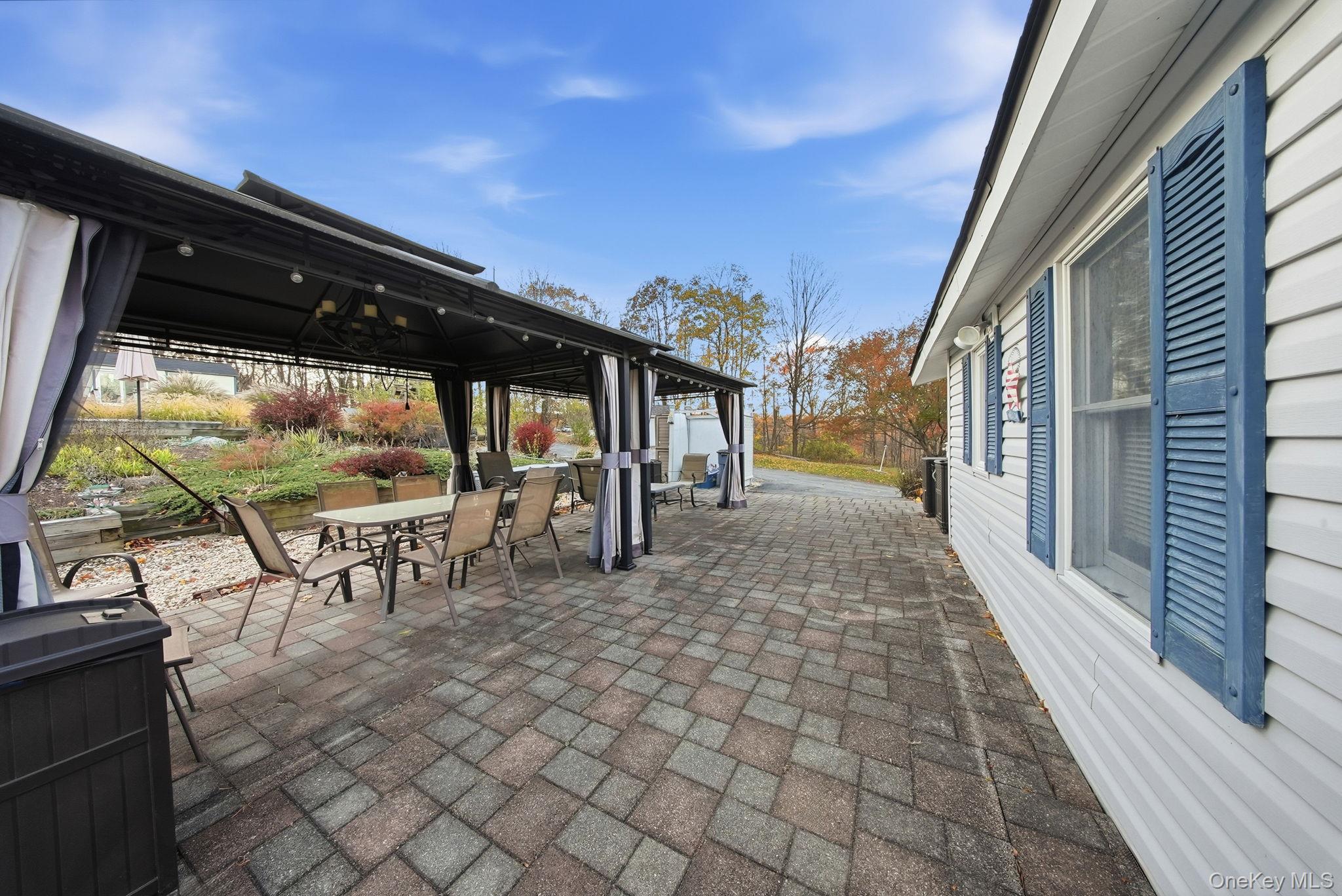 179 Reservoir Road Middletown, NY 10940 - Photo 43 of 50 View of patio / terrace with outdoor dining area and a gazebo