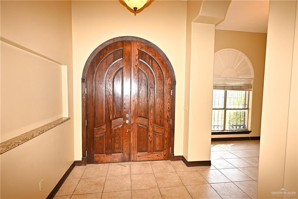 7931 Dallas Circle Mission, TX 78574 - Photo 29 of 33 a view of front door with hallway