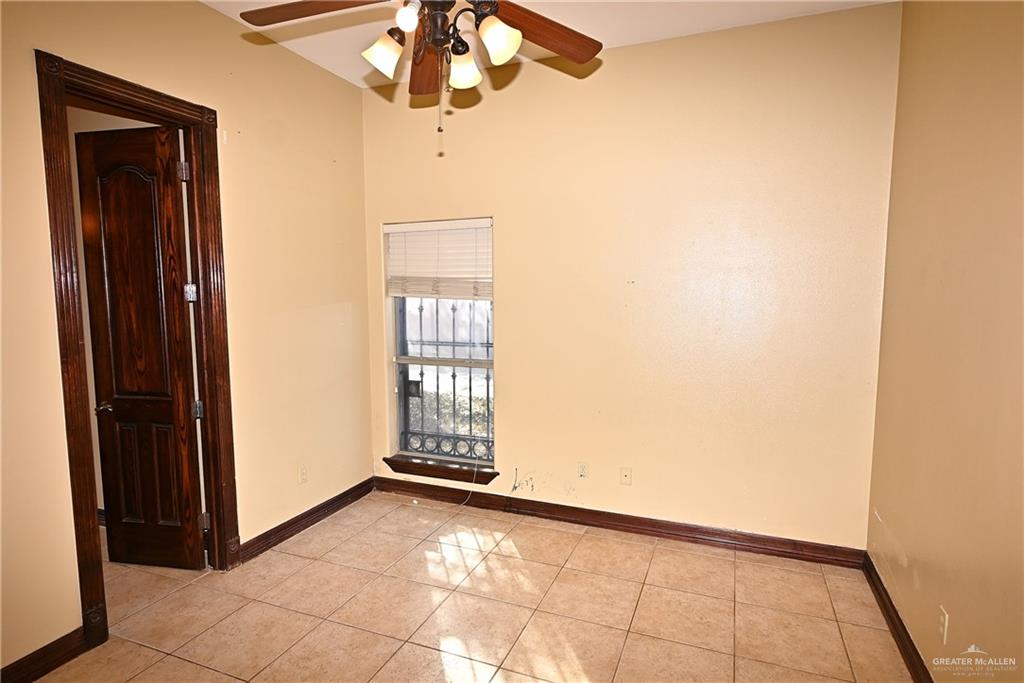 7931 Dallas Circle Mission, TX 78574 - Photo 32 of 33 a view of an empty room with a window