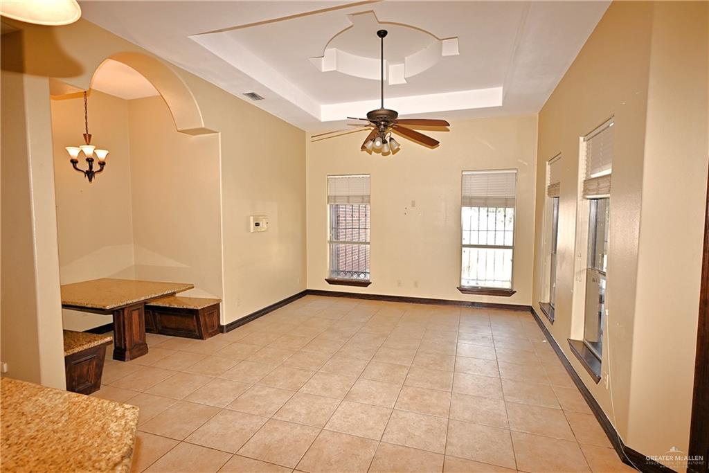 7931 Dallas Circle Mission, TX 78574 - Photo 10 of 33 a view of a livingroom with a chandelier furniture and a window