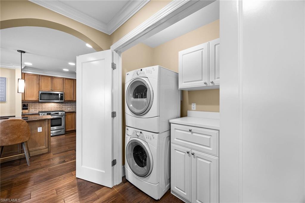 9123 Strada Place, Unit 7501 Naples, FL 34108 - Photo 18 of 28 a view of kitchen with washer and dryer