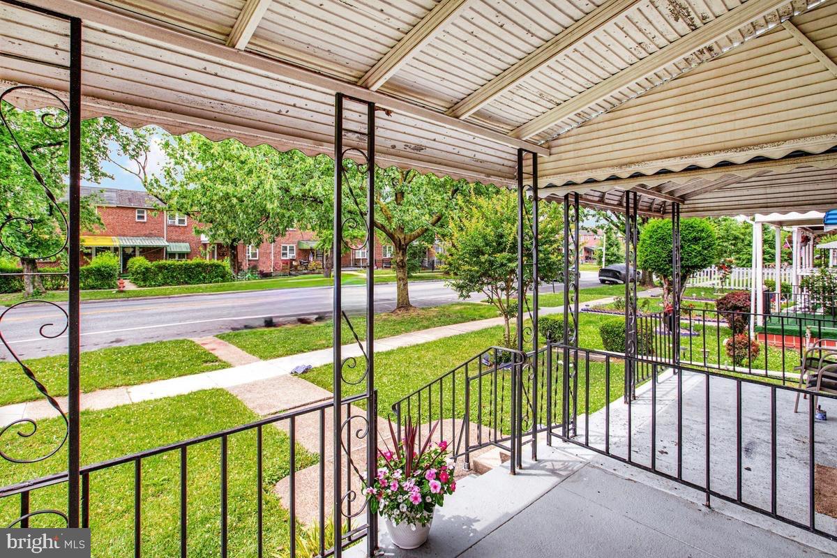 3040 Federal Street Baltimore, MD 21213 - Photo 5 of 41 a view of a porch with a fountain
