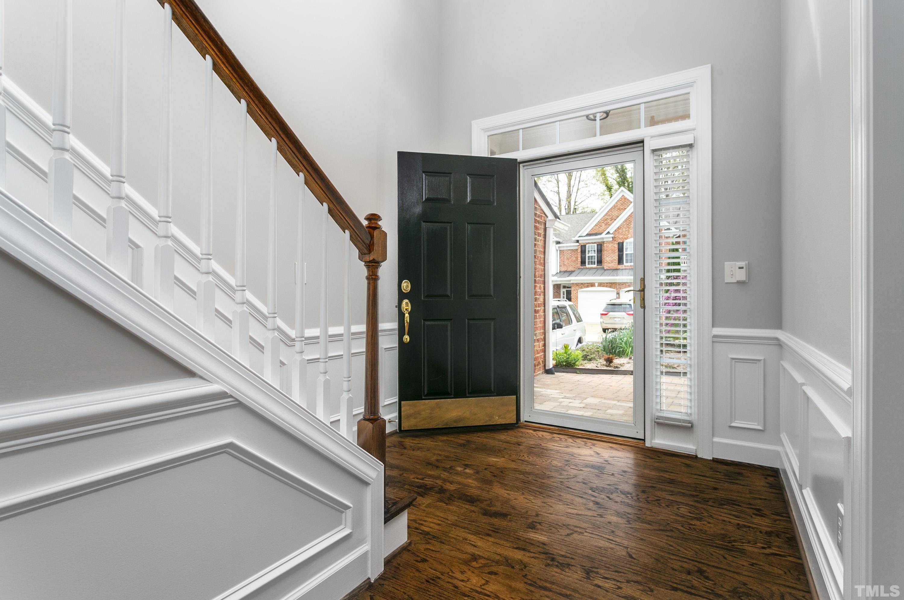 3620 Lion Ridge Court Raleigh, NC 27612 - Photo 11 of 23 a view of an entryway with wooden floor and door
