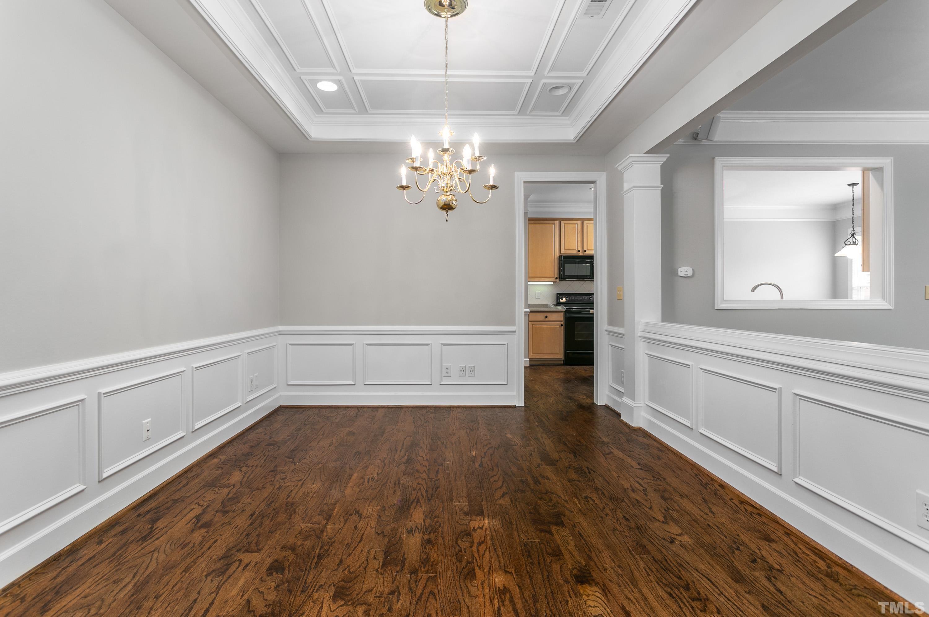 3620 Lion Ridge Court Raleigh, NC 27612 - Photo 13 of 23 wooden floor in an empty room with a window