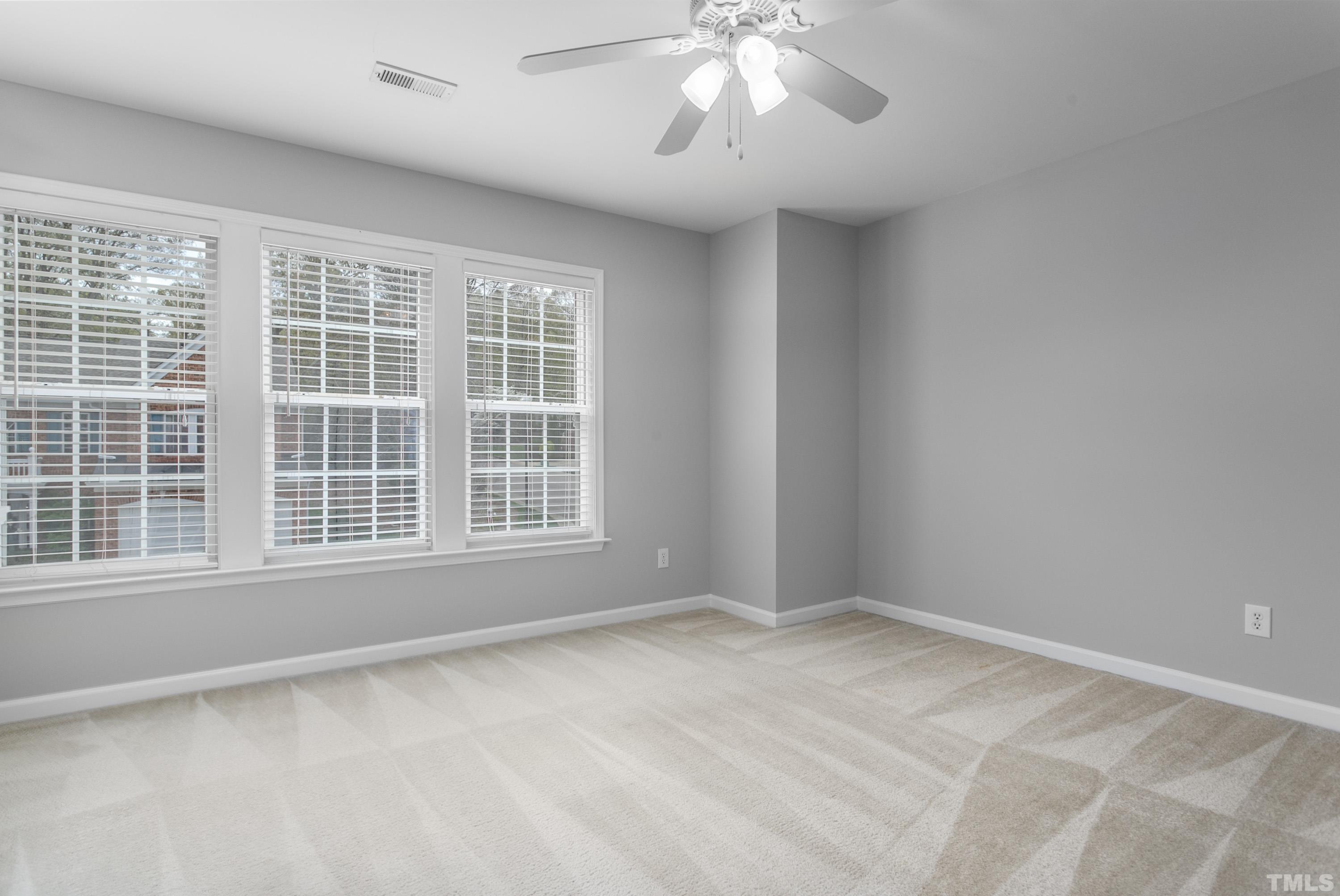 3620 Lion Ridge Court Raleigh, NC 27612 - Photo 21 of 23 a view of an empty room with a window