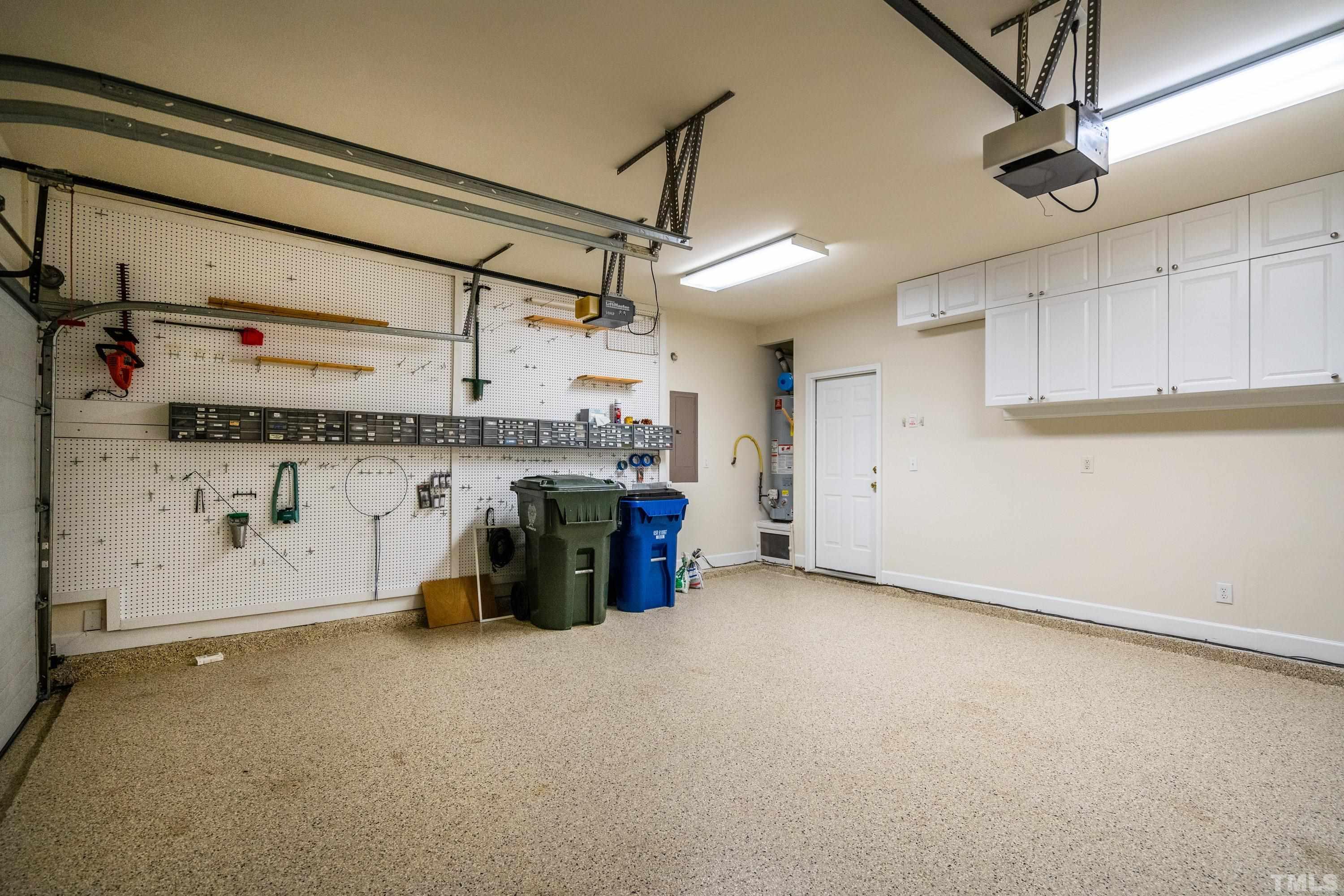 3620 Lion Ridge Court Raleigh, NC 27612 - Photo 7 of 23 a view of a storage & utility room with a sink