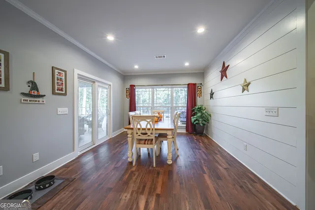 a view of entryway with wooden floor