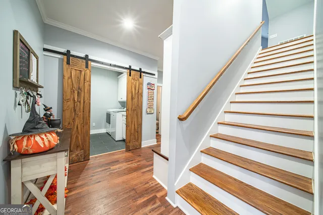 a view of a hallway with closet
