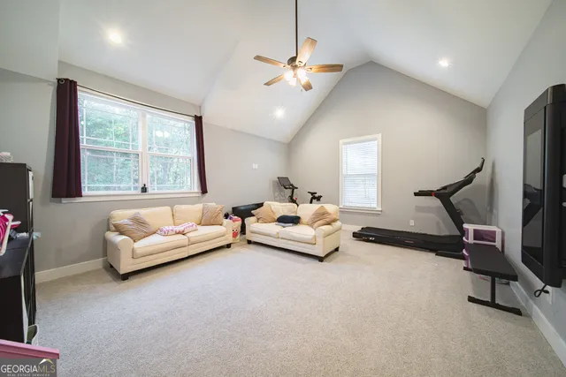 a bed room with a bed and a window