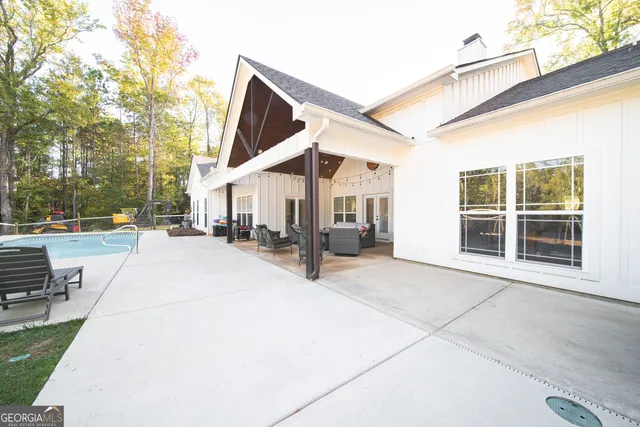 a view of yard with large trees