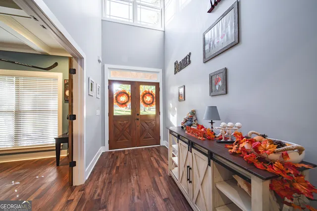 a workspace with furniture hardwood and a window