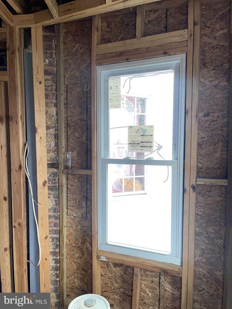 1726 Normal Avenue Baltimore, MD 21213 - Photo 9 of 18 a bathroom with a window
