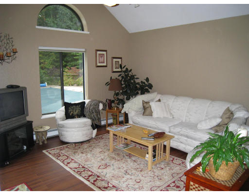 179 Harper Ridge Road Hampstead, NH 03826 - Photo 12 of 26 a living room with furniture and a potted plant