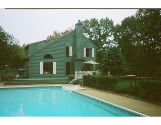 179 Harper Ridge Road Hampstead, NH 03826 - Photo 25 of 26 a backyard of a house with lots of green space