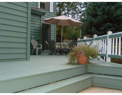 179 Harper Ridge Road Hampstead, NH 03826 - Photo 5 of 26 a backyard of a house with seating space
