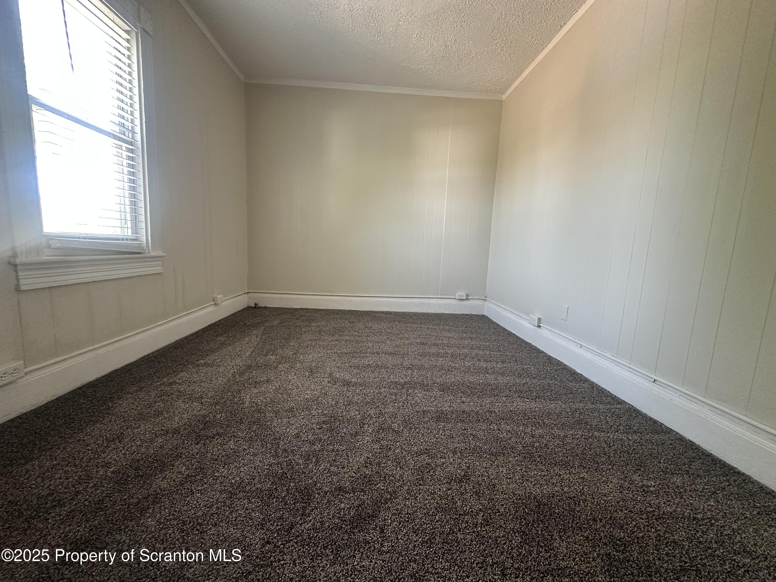 821 Maple Street Scranton, PA 18505 - Photo 11 of 21 an empty room with a window